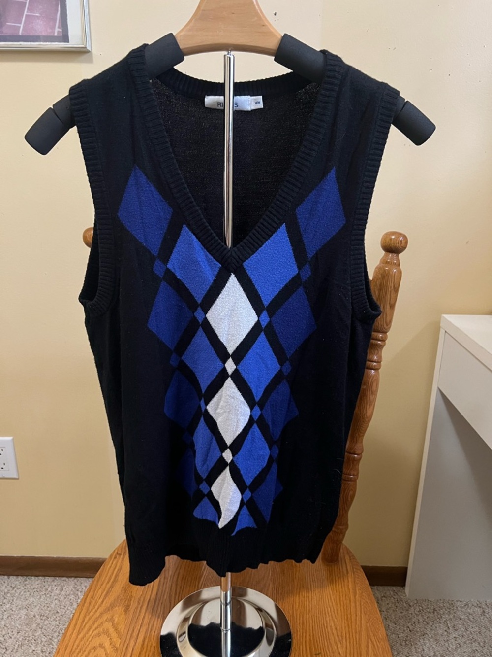 Ricki's Black Sweater Vest with Blue and White Argyle Detail